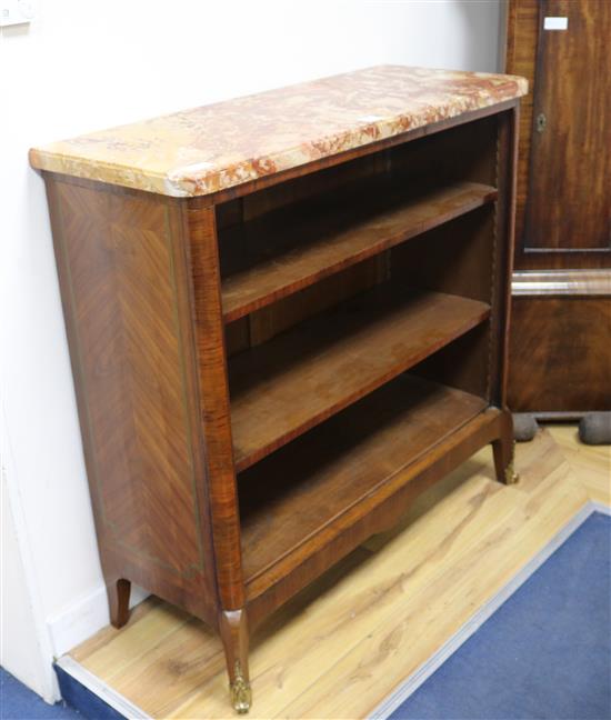 A late 19th century French kingwood open bookcase, with marble top, W.104cm H.101cm